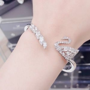 SWAN LAKE BANGLE, WHITE, RHODIUM PLATIN
